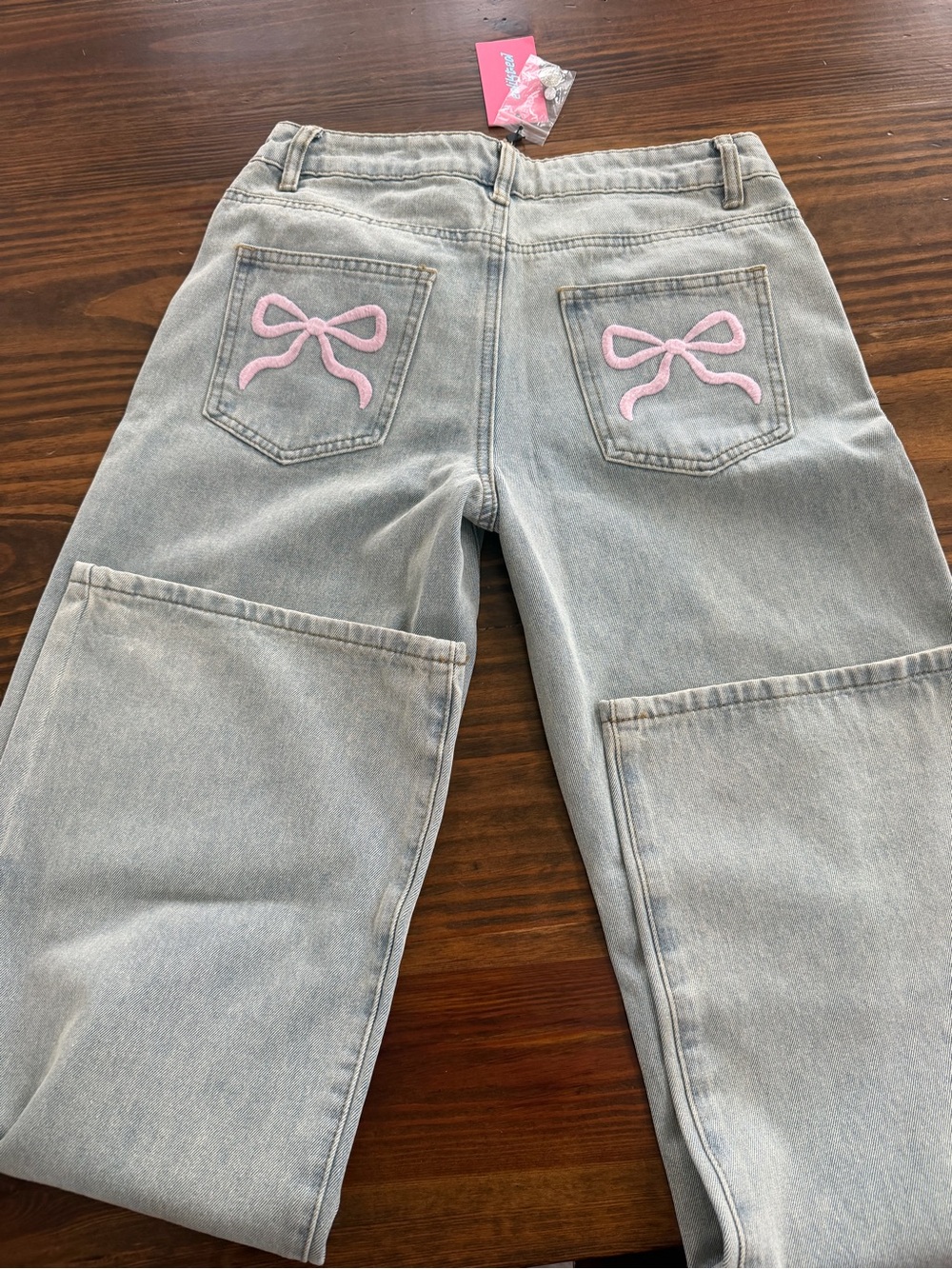 Edikted Light Blue Wide-Leg Jeans with Pink Bow Pockets